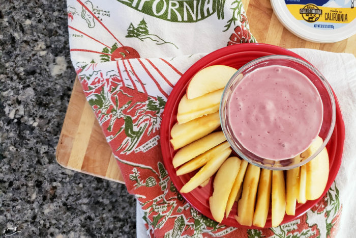 This pink fruit dip is a simple, delicious, and healthy snack! Made with Real California Milk it's a good source of protein and essential vitamins and minerals!