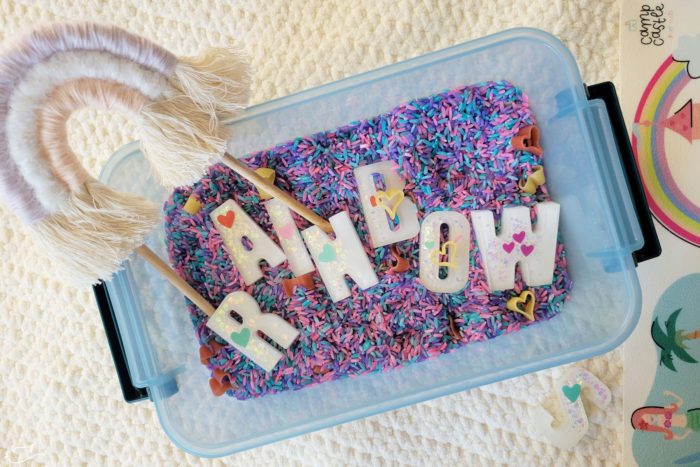 Resin letters and yarn rainbows from small shops.