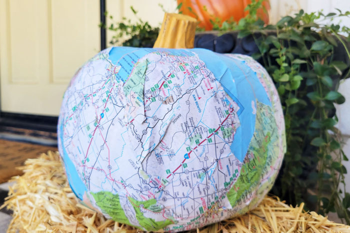 DIY Mod Podge map pumpkin for Halloween.