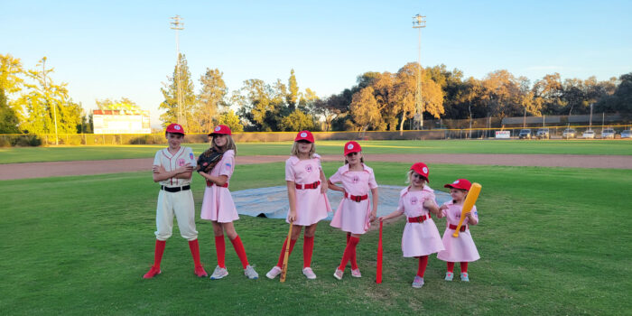 Sibling vintage baseball team costumes.