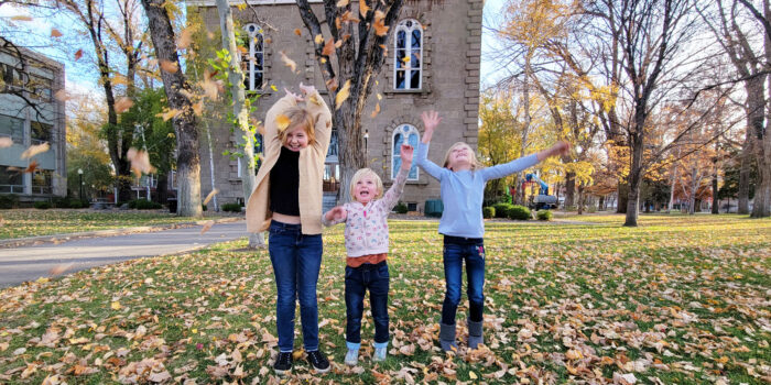 Playing in the leaves this fall with your family.